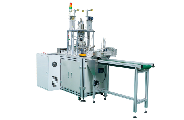 Out-of-plane ear-loop mask machine