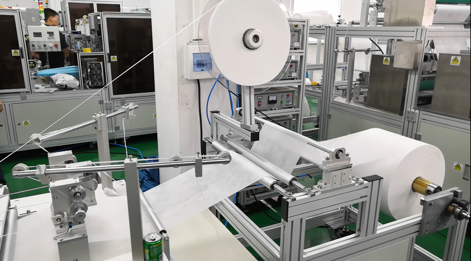 Non woven shoe cover making machine