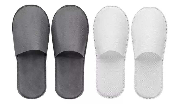 Why do hotels choose disposable slippers?